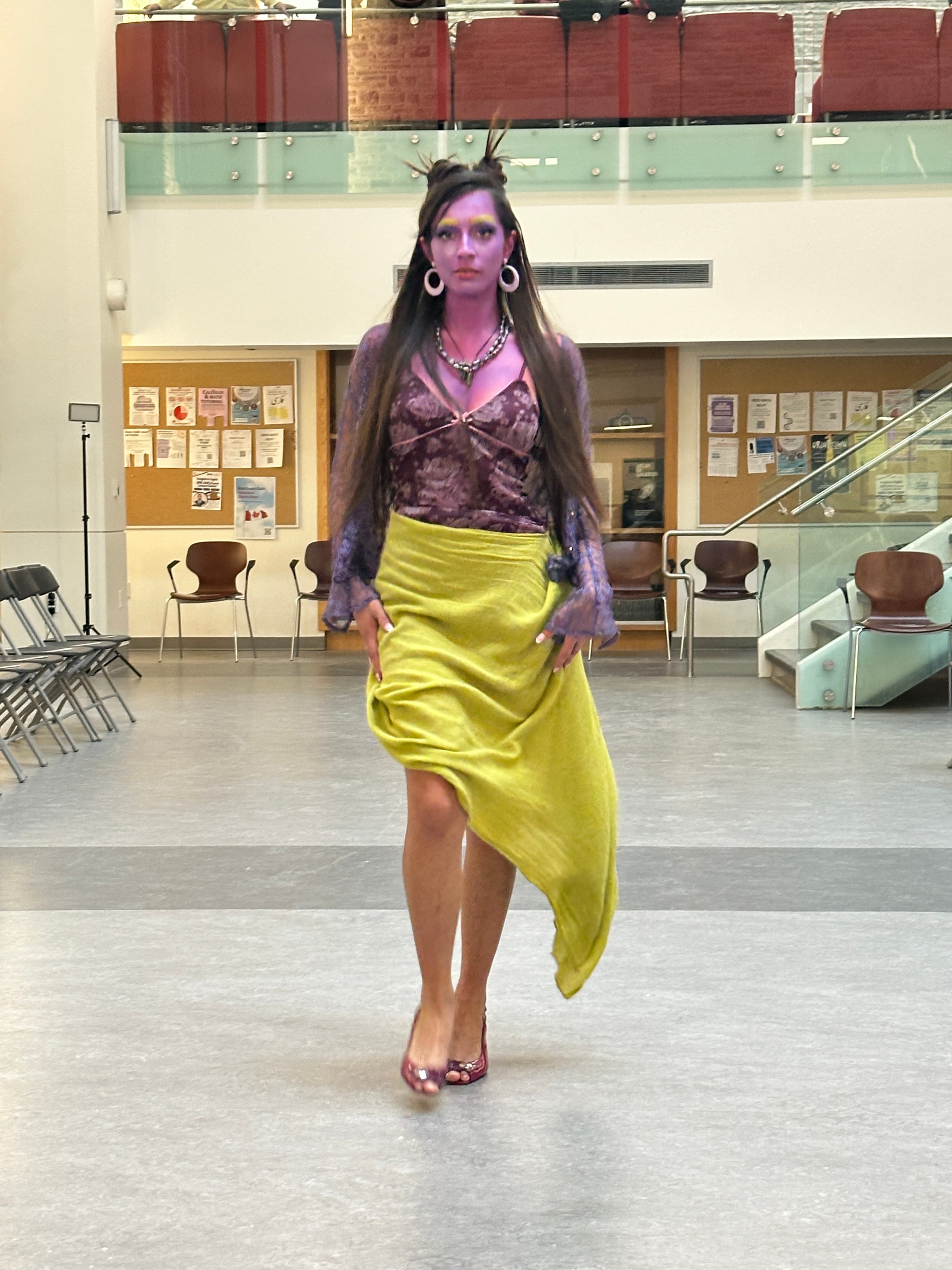 Runway look 18 from Revelations collection