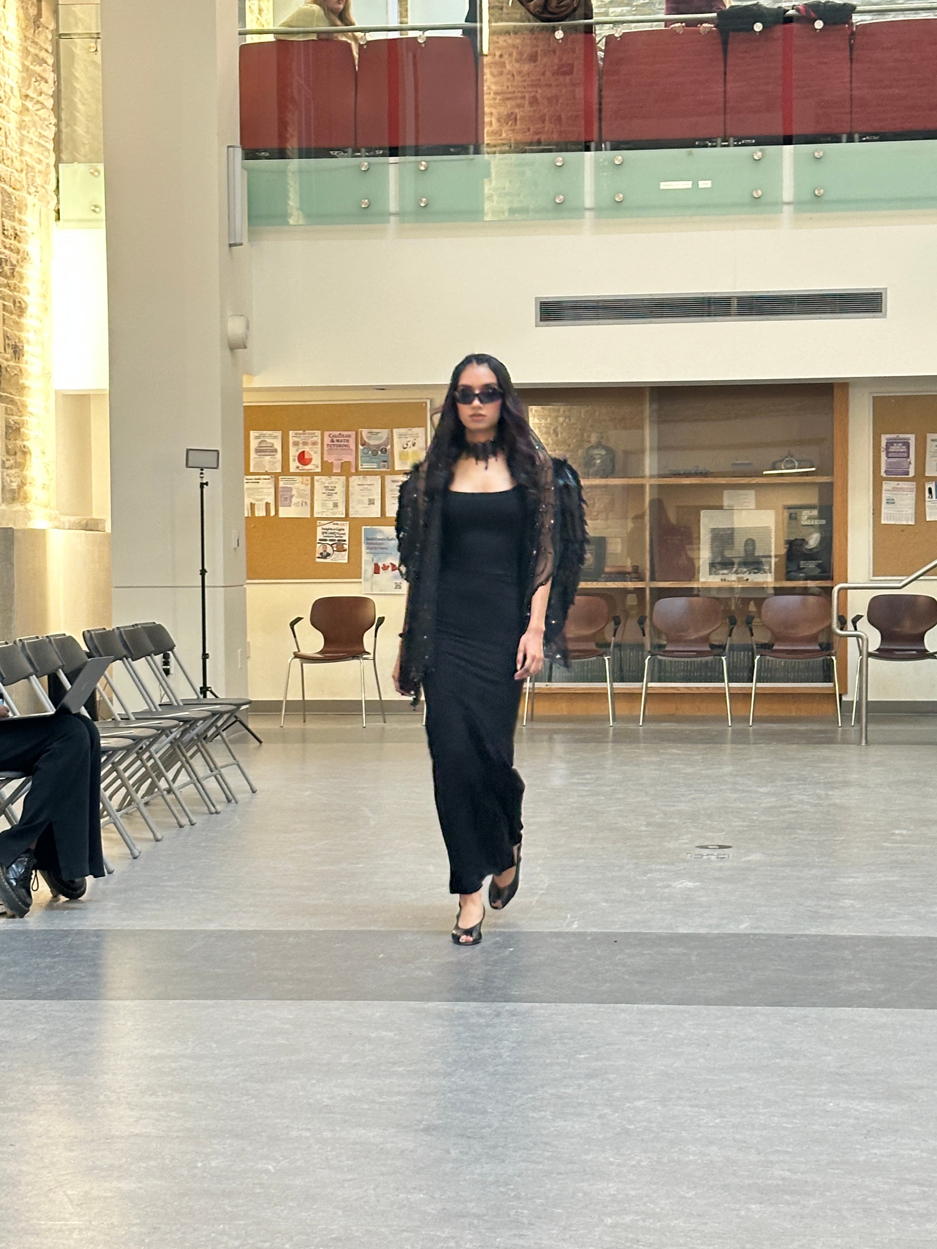 Runway look 22 from Revelations collection