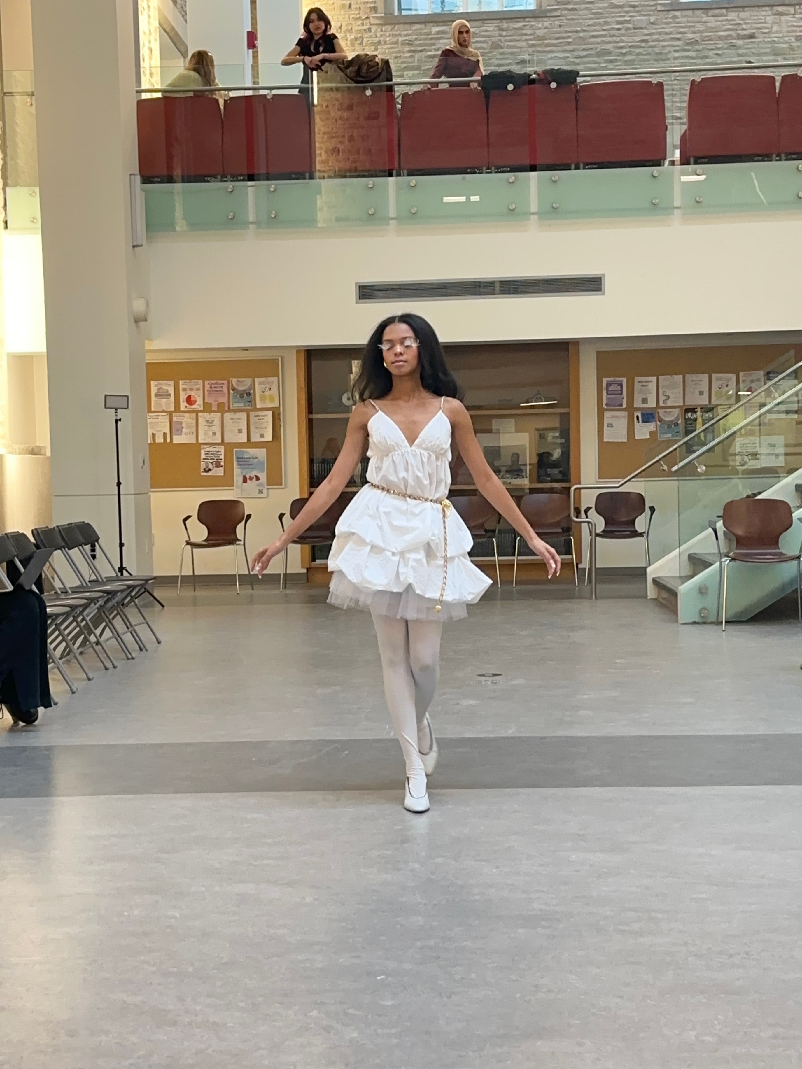 Runway look 23 from Revelations collection