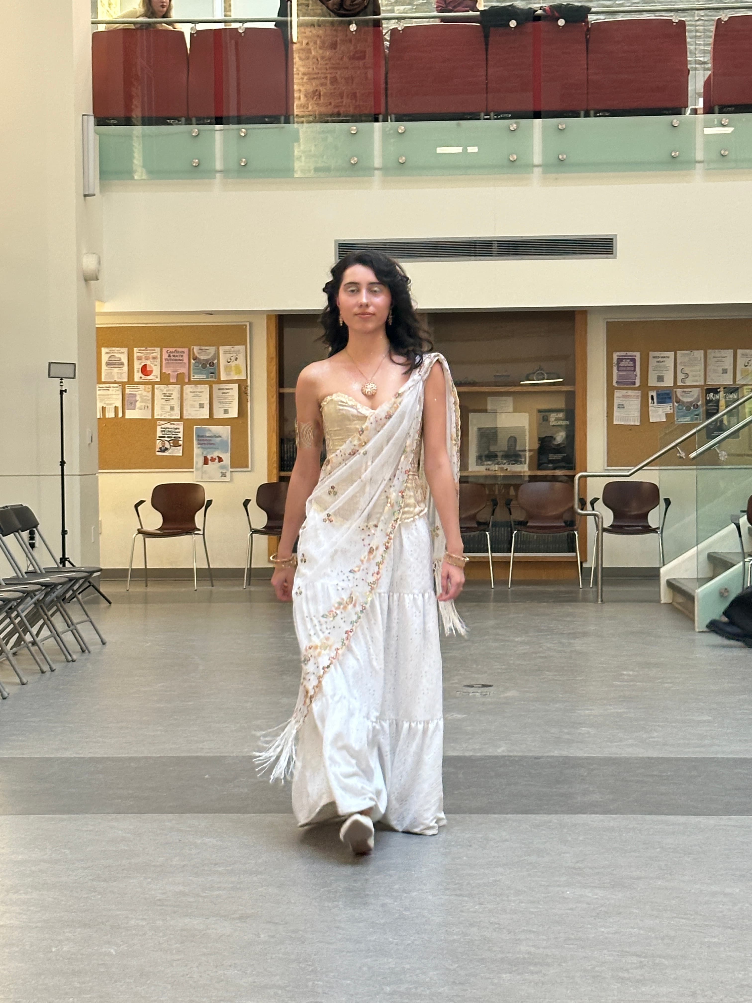 Runway look 26 from Revelations collection